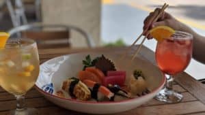 Assorted sushi platter with fresh fish, rice, and garnishes at Thai Lotus Restaurant Florida.